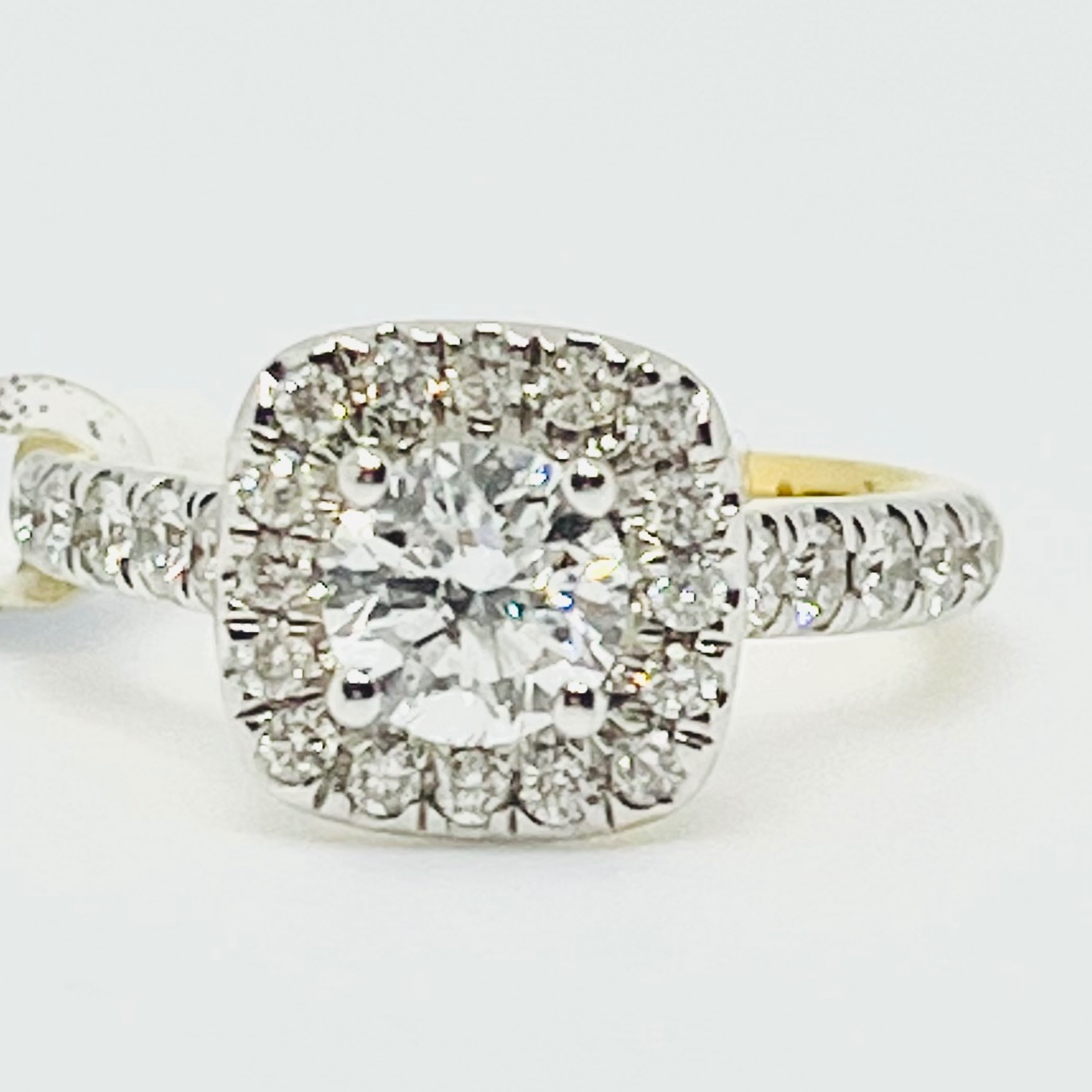Solitaire with Halo Engagement Ring