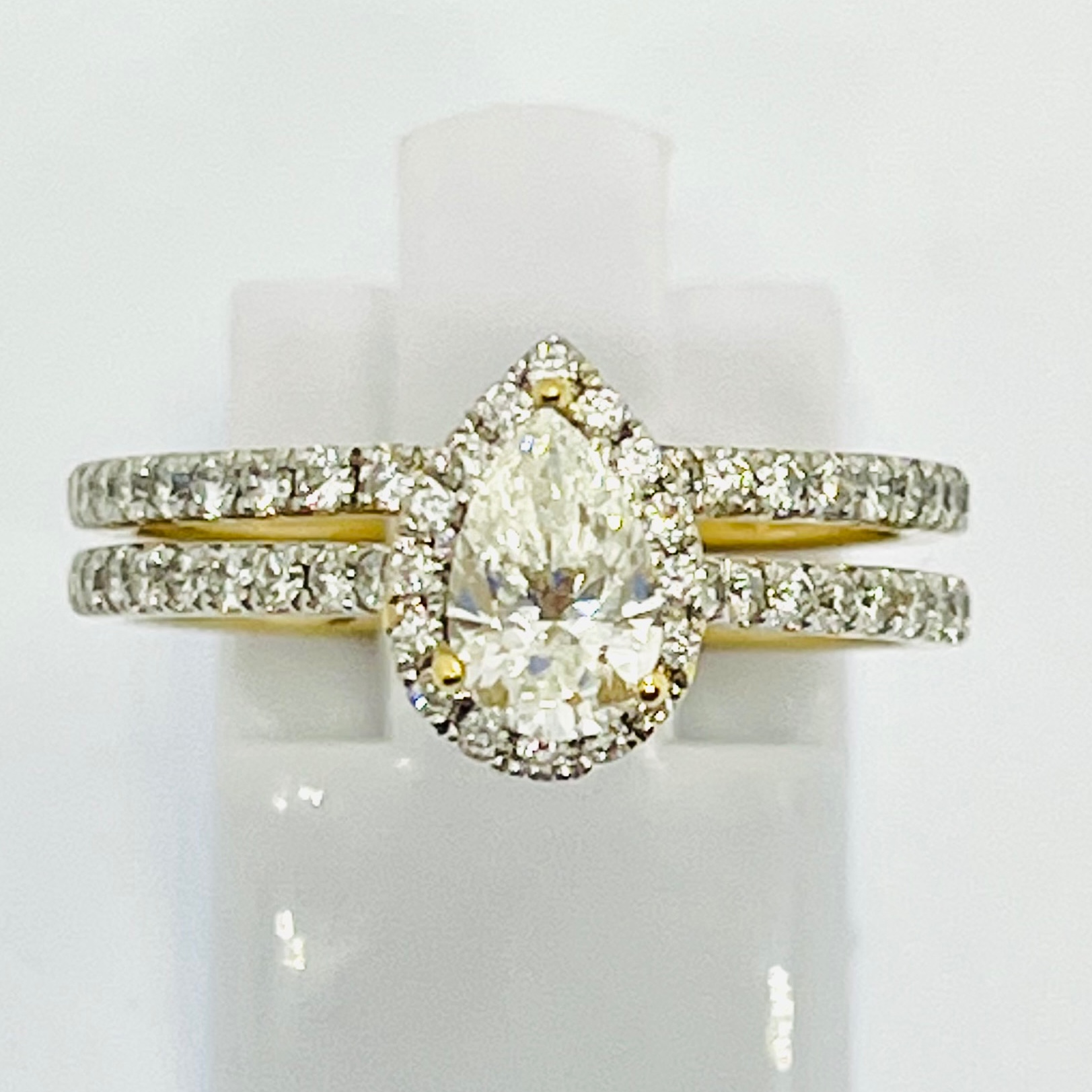 Solitaire Pear Cut Bridal Set with Halo